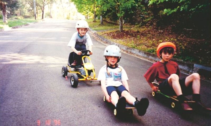 A childhood picture of Ellyse Perry with her brother, Damian, and a friend