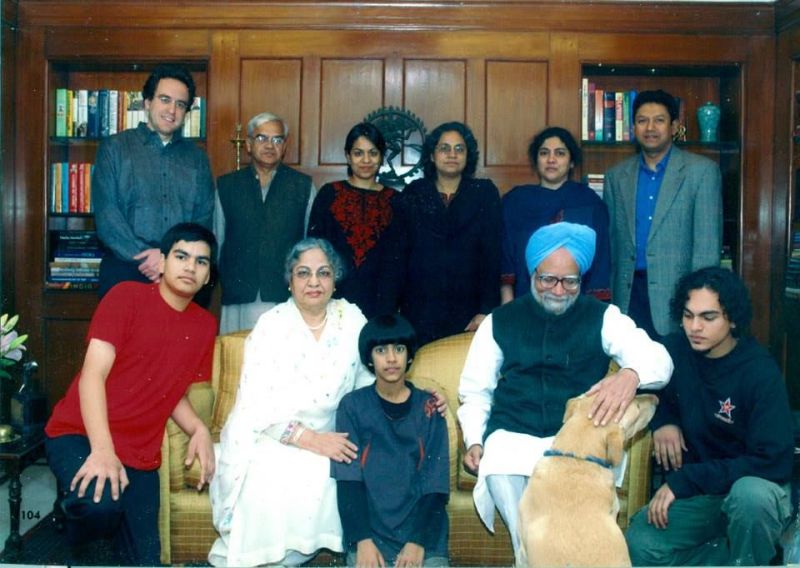 A family picture of Manmohan Singh featuring Daman Singh's son, Rohan (sitting in center with Gursharan Kaur)
