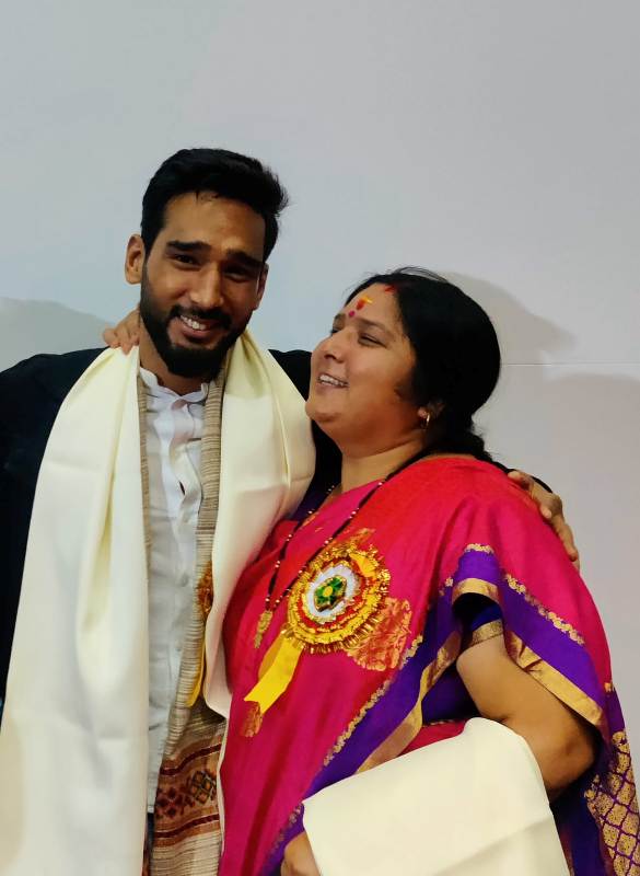 A photo of Anshul with his mother
