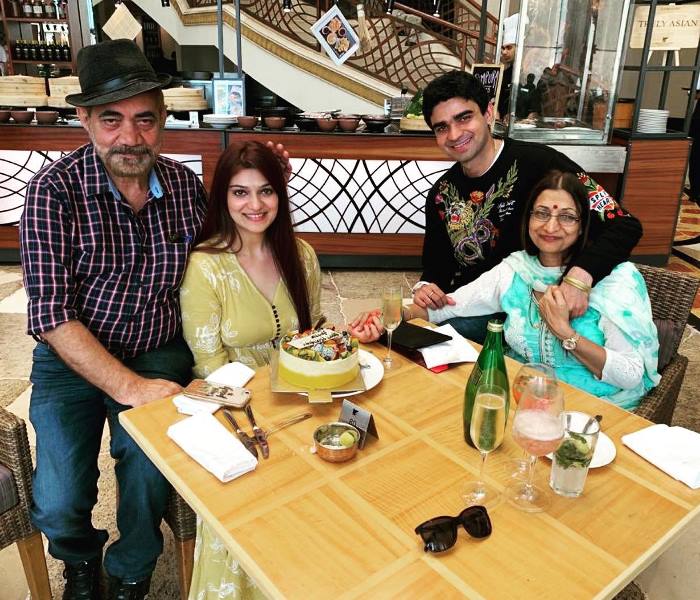 Aditi Gautam with her parents and brother