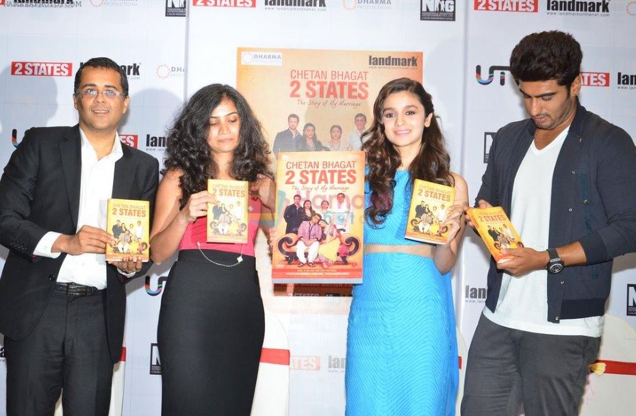 Anusha Bhagat and Chetan Bhagat with Alia Bhatt and Arjun Kapoor during the new cover launch of Chetan Bhagat's book 2 States