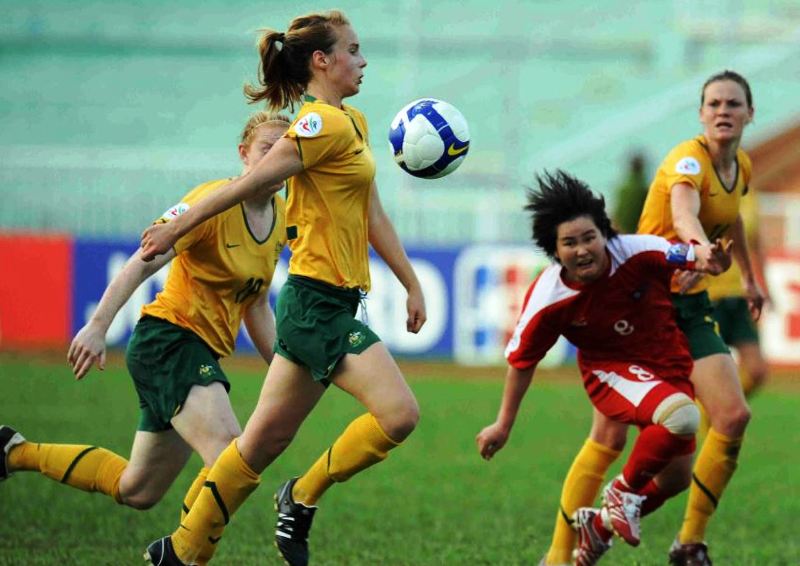 Ellyse Perry playing soccer for Australia