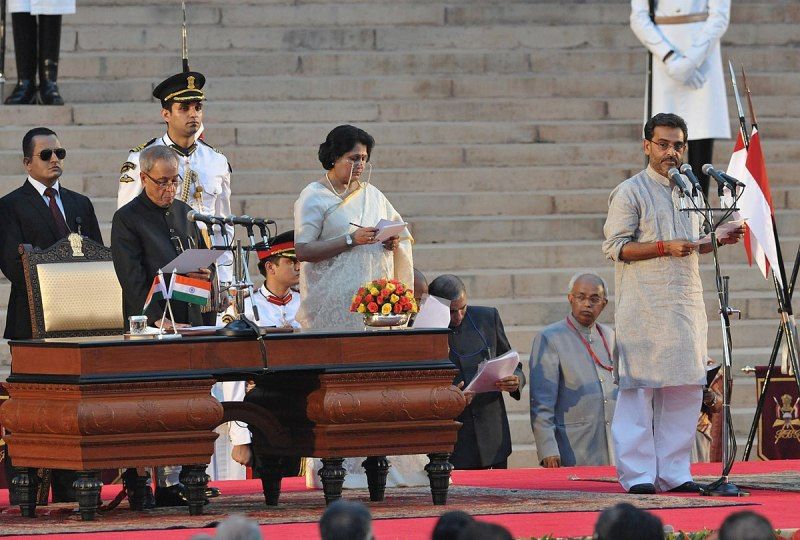 Former President Pranab Mukherjee administering the oath as Minister of State to Upendra Kushwaha at a Swearing-in Ceremony at Rashtrapati Bhavan in New Delhi on 26 May 2014