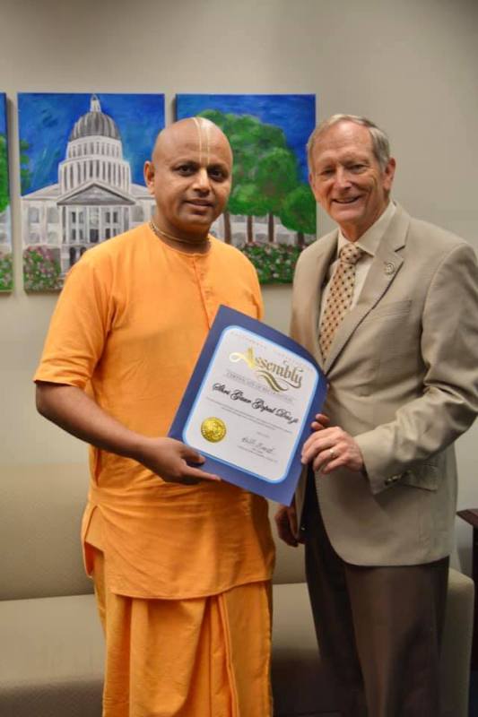 Gaur Gopal Das while receiving the 'Certificate of Recognition' at the California State Assembly by Bill Quirk