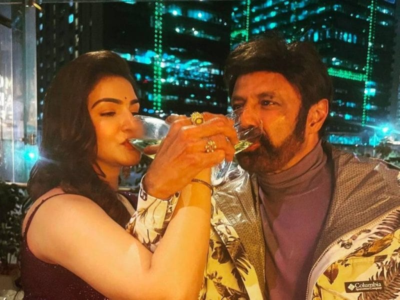 Honey Rose drinking champagne with Nandamuri Balakrishna, a South Indian actor