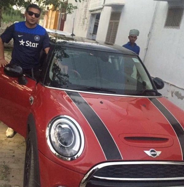 Joginder Sharma with his Mini Cooper car