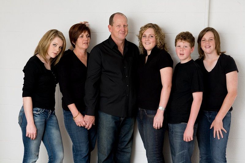 Laura Harris with her sister Eliza (left), mother, father, brother and sister Grace