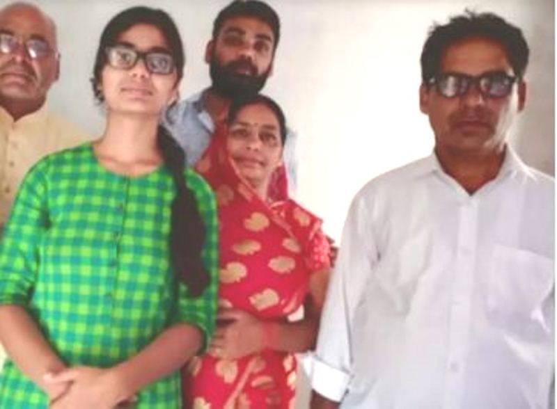 Neha Singh Rathore with her family