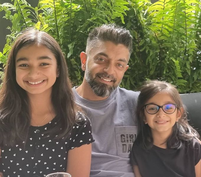 Nikhil Patel with his daughters, Aariyana Patel (left) and Aanika Patel (right)