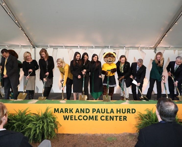 Paula Hurd with her two daughters and others at the groundbreaking ceremony in 2020