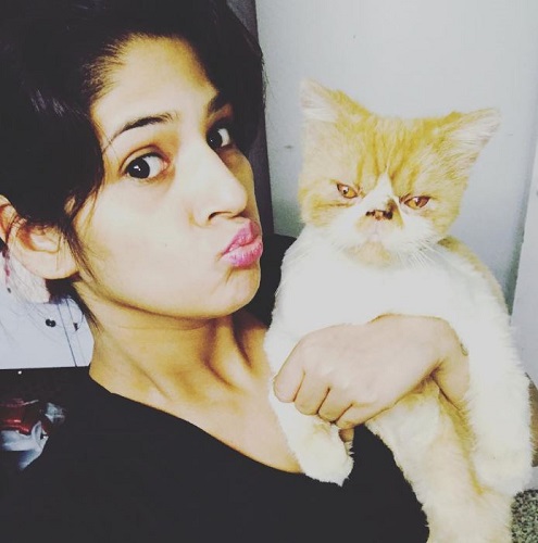 Sapna Gill and her pet cat