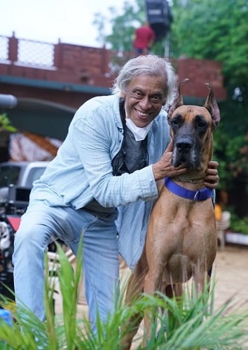 Sudhir Mishra with a dog
