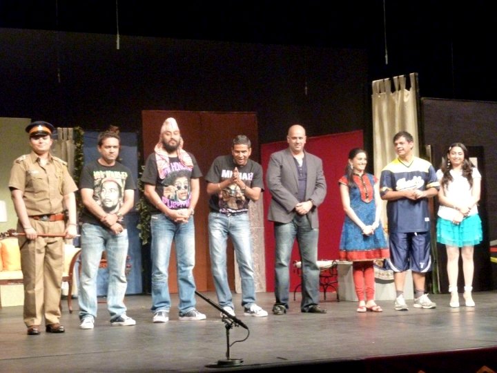 Tanya Abrol (leftmost) posing with the cast and makers of the theatrical production Get Rid of My Wife in 2010