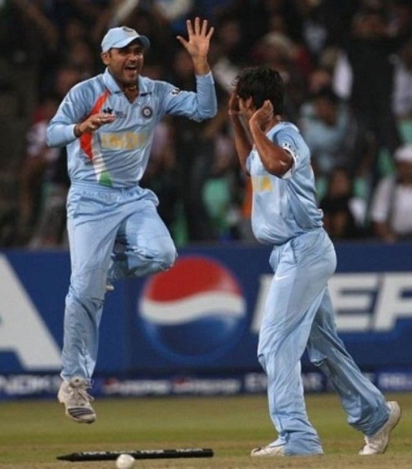 Virender Sehwag (left) celebrating a dismissal in the 2007 T20 World Cup