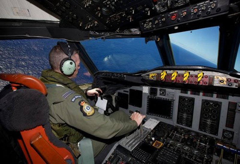 11 April 2014: Captain Flt. Lt. Tim McAlevey of the Royal New Zealand Air Force while flying a P-3 Orion in search for the missing Malaysia Airlines Flight MH370 over the Indian Ocean