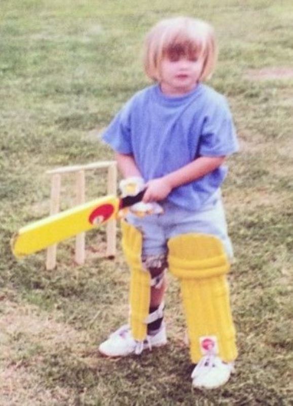 A childhood picture of Jess Jonassen playing cricket