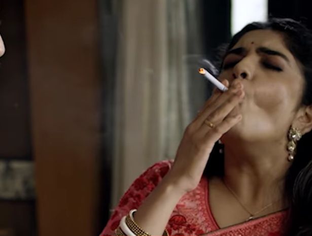 A picture of Manosi Sengupta smoking