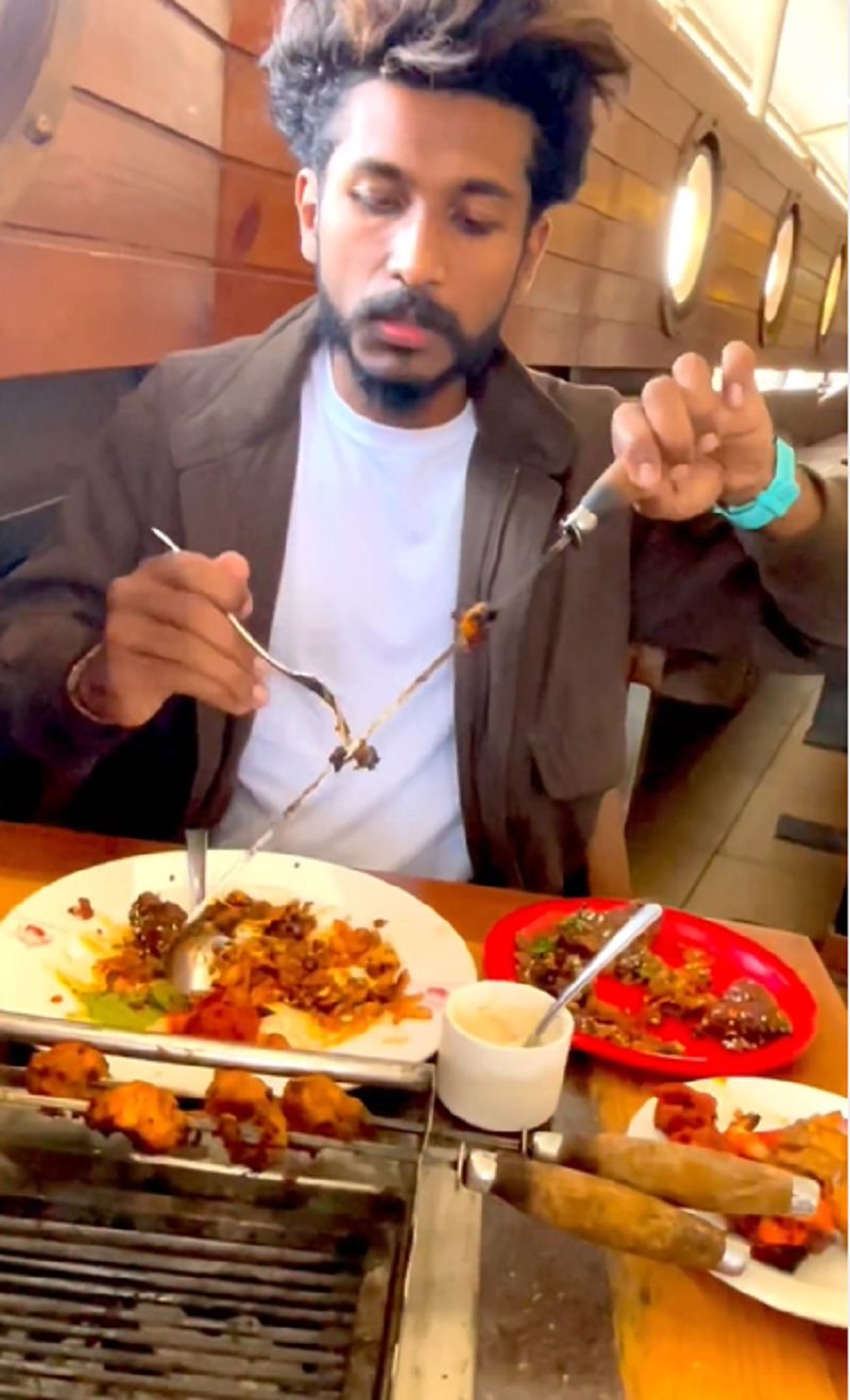 Aniyan Midhun eating chicken