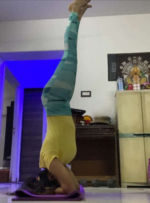 Bhagyashree Mote doing a headstand