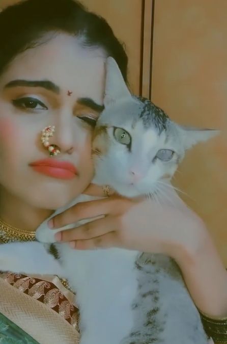 Bhagyashree with her cat in a reel
