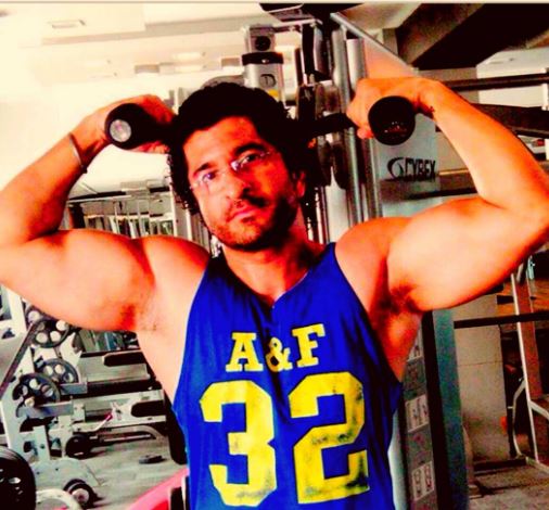 Daljeet Singh Kalsi working out in a gym