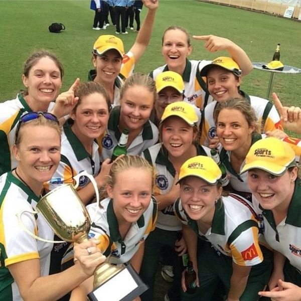 Erin Burns with her Bankstown Sports Women’s Cricket Club teammates celebrating their cup victory