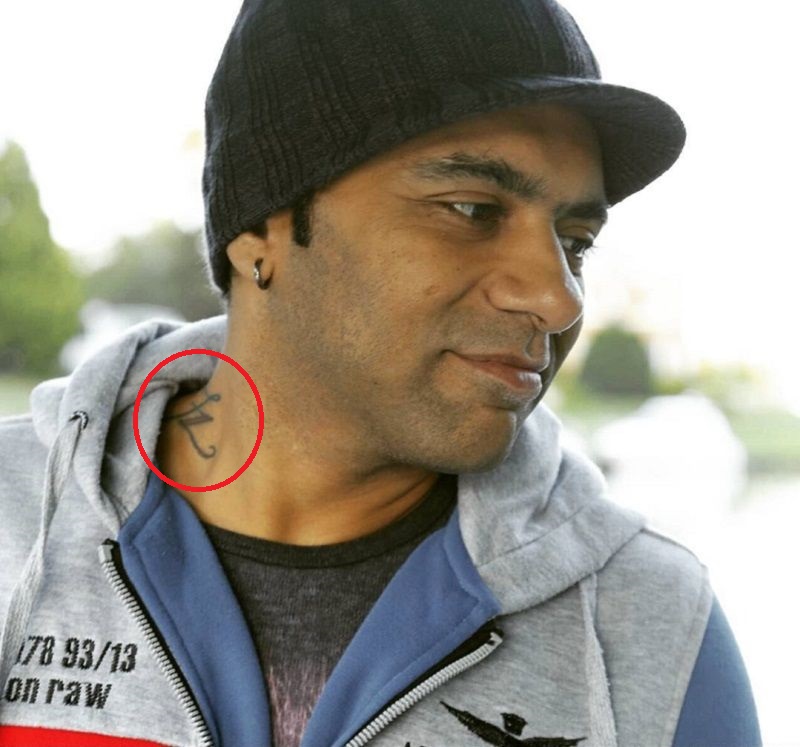 Farhad Samji's tattoo on his neck