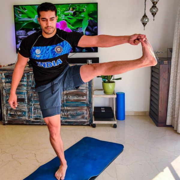 Harman Singha practising yoga