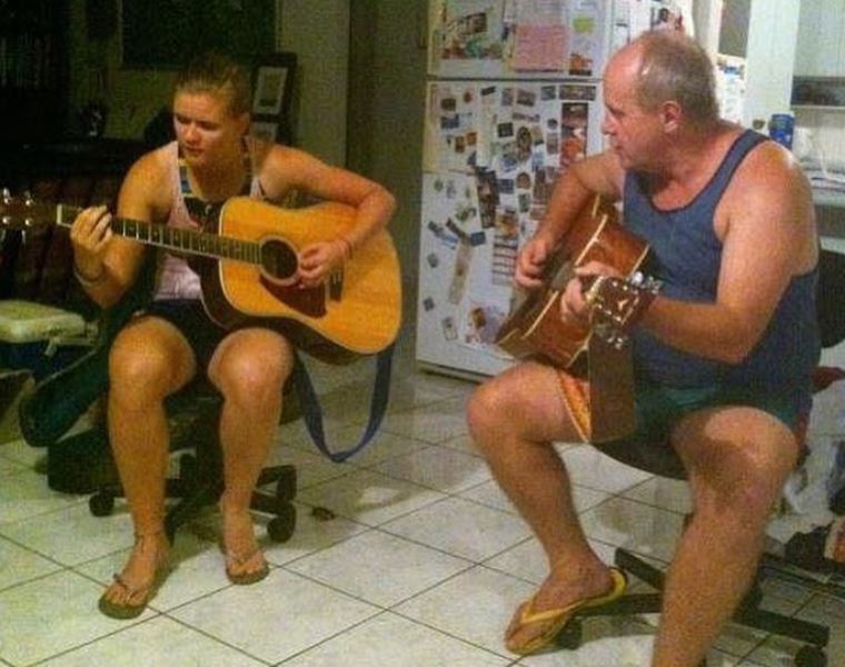 Jess Jonassen and her father playing the guitar