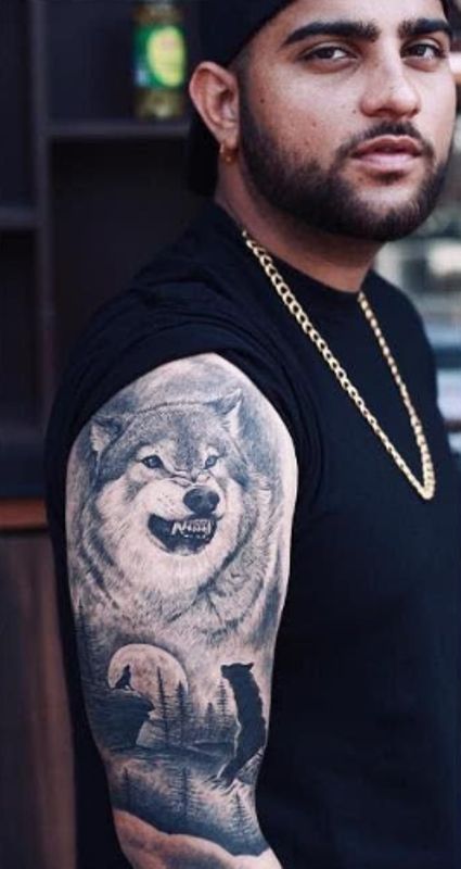 Karan Aujla's wolf tattoo