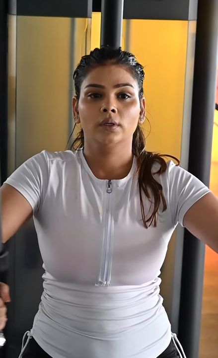 Payal Malik working out in the gym