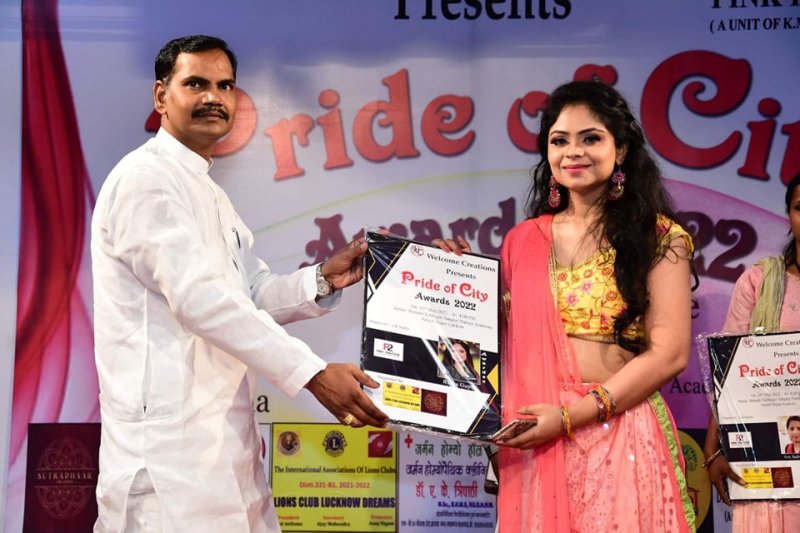 Ritika Gupta while receiving the Pride of City Award in 2022