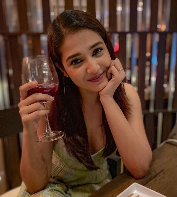 Roshni Bhattacharyya drinking red wine