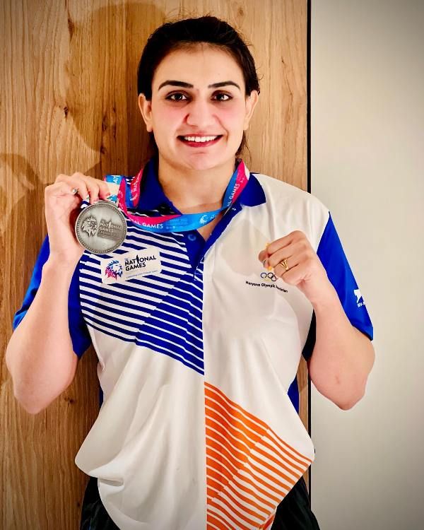 Saweety Boora posing after winning silver medal at the 36th National Games in Gujarat in 2022