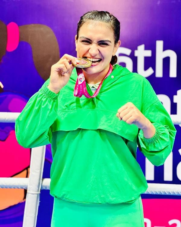 Saweety Boora posing with her gold medal, which she won at the 6th Elite Women's National Boxing Championship at Bhopal, Madhya Pradesh in 2022