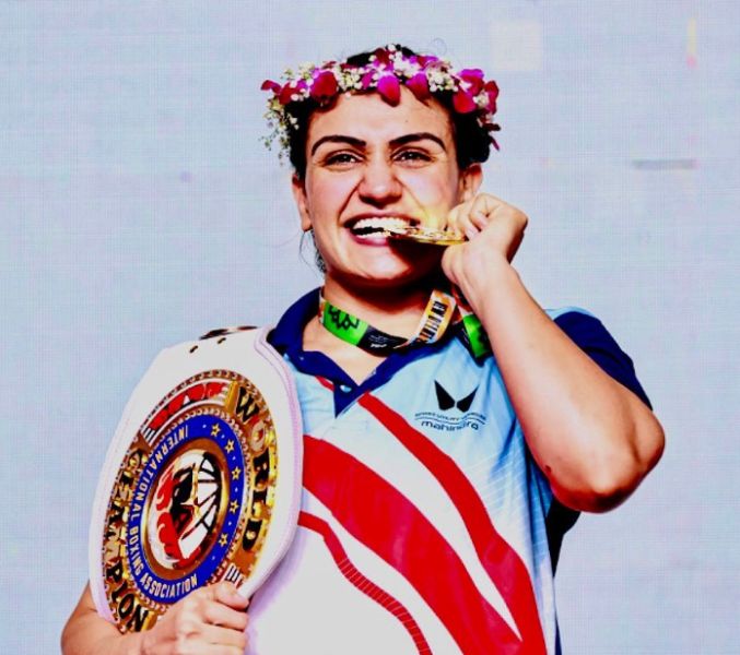 Saweety Boora posing with her gold medal, which she won at the Women's World Boxing Championship, held in New Delhi in 2023