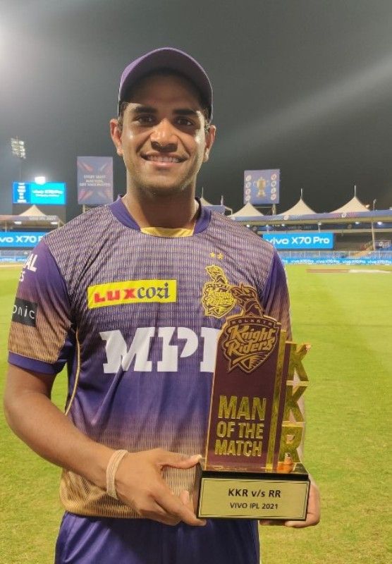 Shivam Mavi with a Man of the Match award he won in IPL 2021