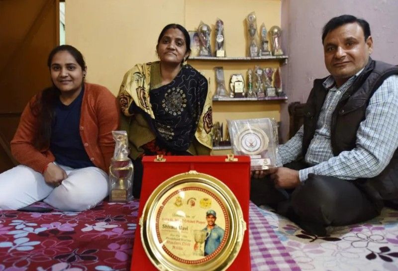 Shivam Mavi's father, Pankaj Mavi, mother, Kavita Mavi, and sister, Shalu Mavi (left to right)