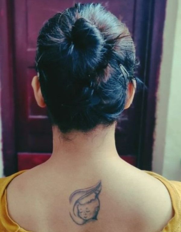 Sridevi Menon's neck tattoo