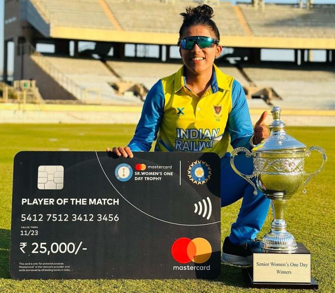 Tanuja Kanwar with the Player of the Match Award and the 2022-2023 Women's Senior One Day Trophy