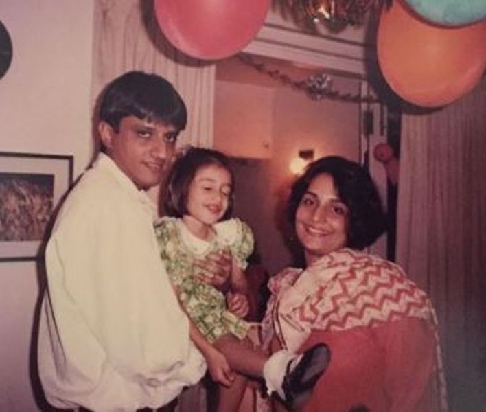 A childhood picture of Krishna Bhatt with her parents
