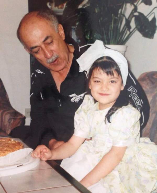 A childhood picture of Roya Sami Khan with her father