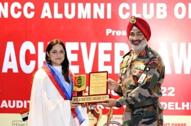 A photo of Baljeet Kaur taken while she was receiving the NCC Achievers Award