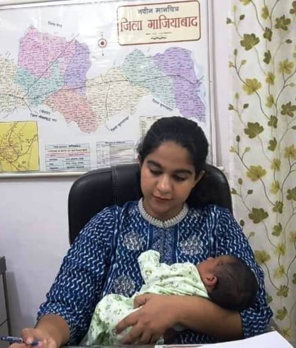 A photo of Saumya Pandey with her newborn daughter