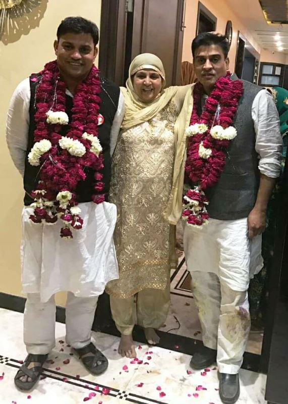A picture of Irfan Solanki with his mother and brother, Rizwan Solanki