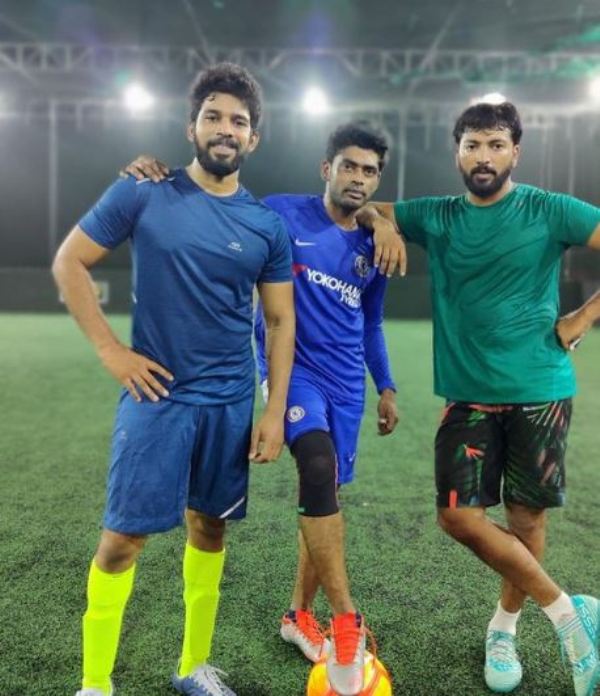 A picture of Kalaiyarasan Arjun and his friends after playing football