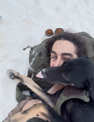 Adam Bedi and his pet dog