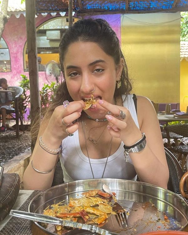 Alia Chhiba eating seafood