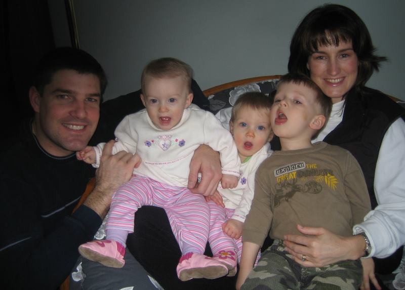 An old photograph of Jeremy Hansen with his wife and children