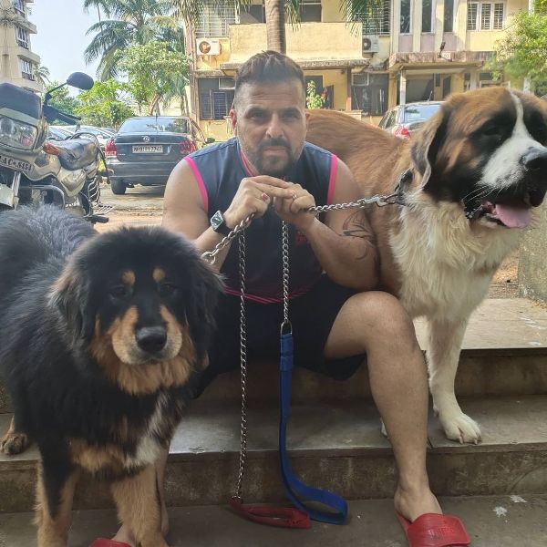 Bhakhtyar Irani with his pet dogs, Eminem Irani and Cardeebee Irani (left)